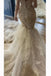 Gorgeous Long Sleeves Tulle Mermaid Wedding Dress with Appliques UQW0123