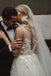 A Line V Neck Sleeveless Tulle Beach Wedding Dress with Lace Appliques UQ2551