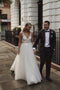A Line V Neck Sleeveless Tulle Beach Wedding Dress with Lace Appliques UQ2551